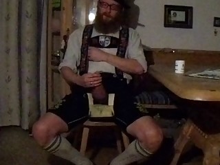 Man in lederhosen teases his achy prick