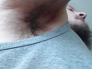 Alpha gives hairy armpit sniff
